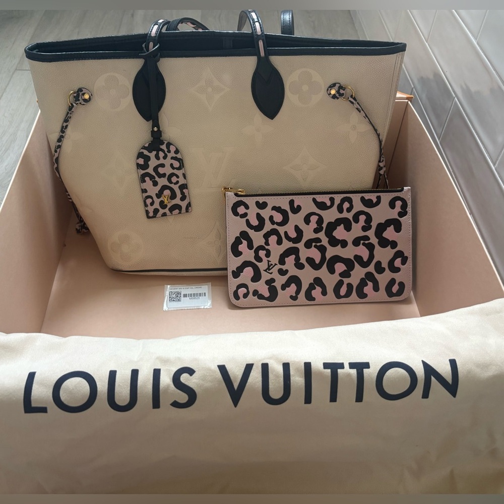 Authentic Louis Vuitton Neverfull
MM Wild at Heart Cream - Limited Edition 2021